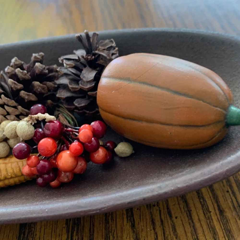 Fall-Themed Decorative Centerpiece in a long shallow bowl.